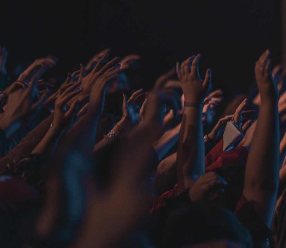 people raising hands