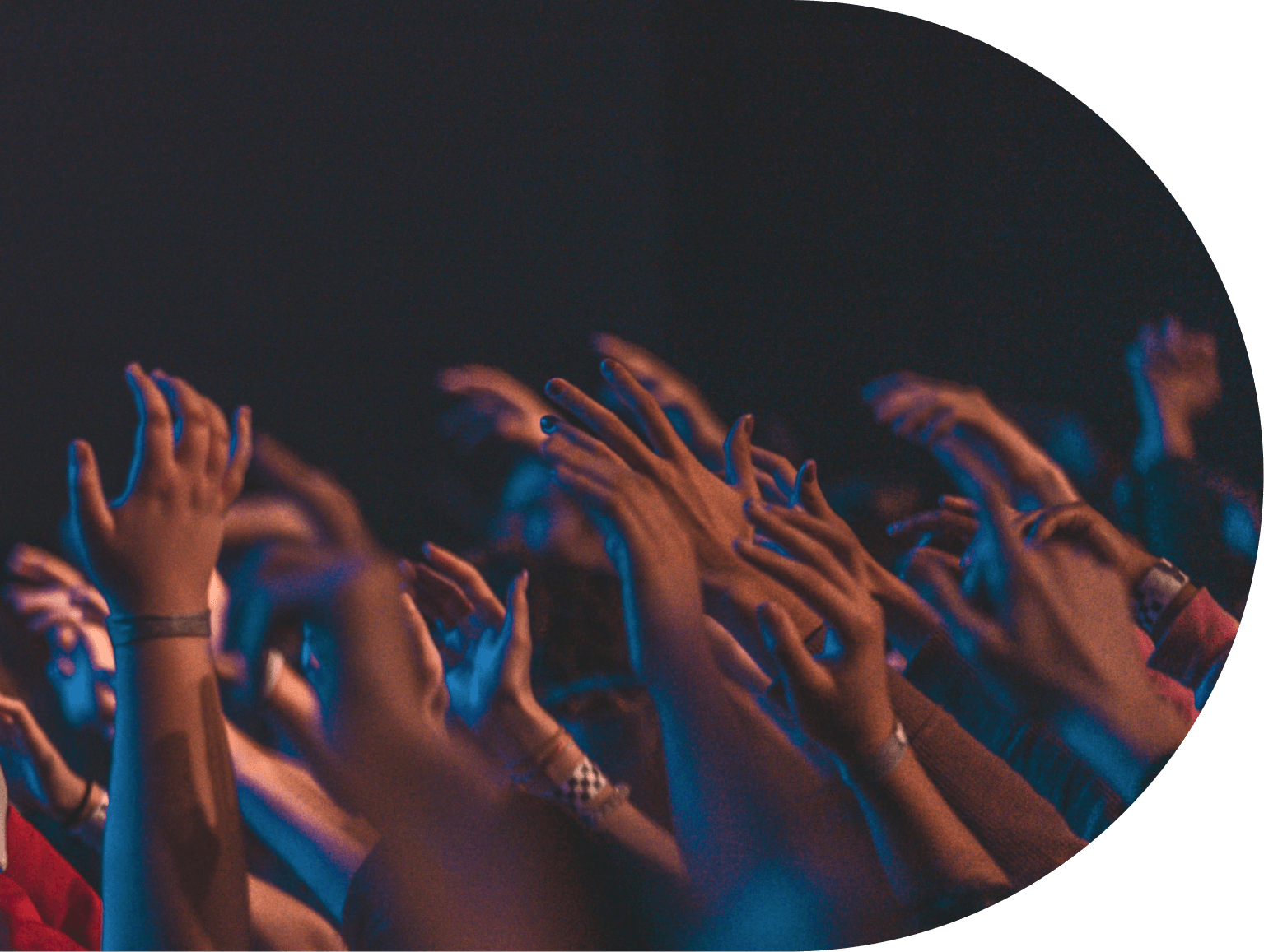 youth raising hands